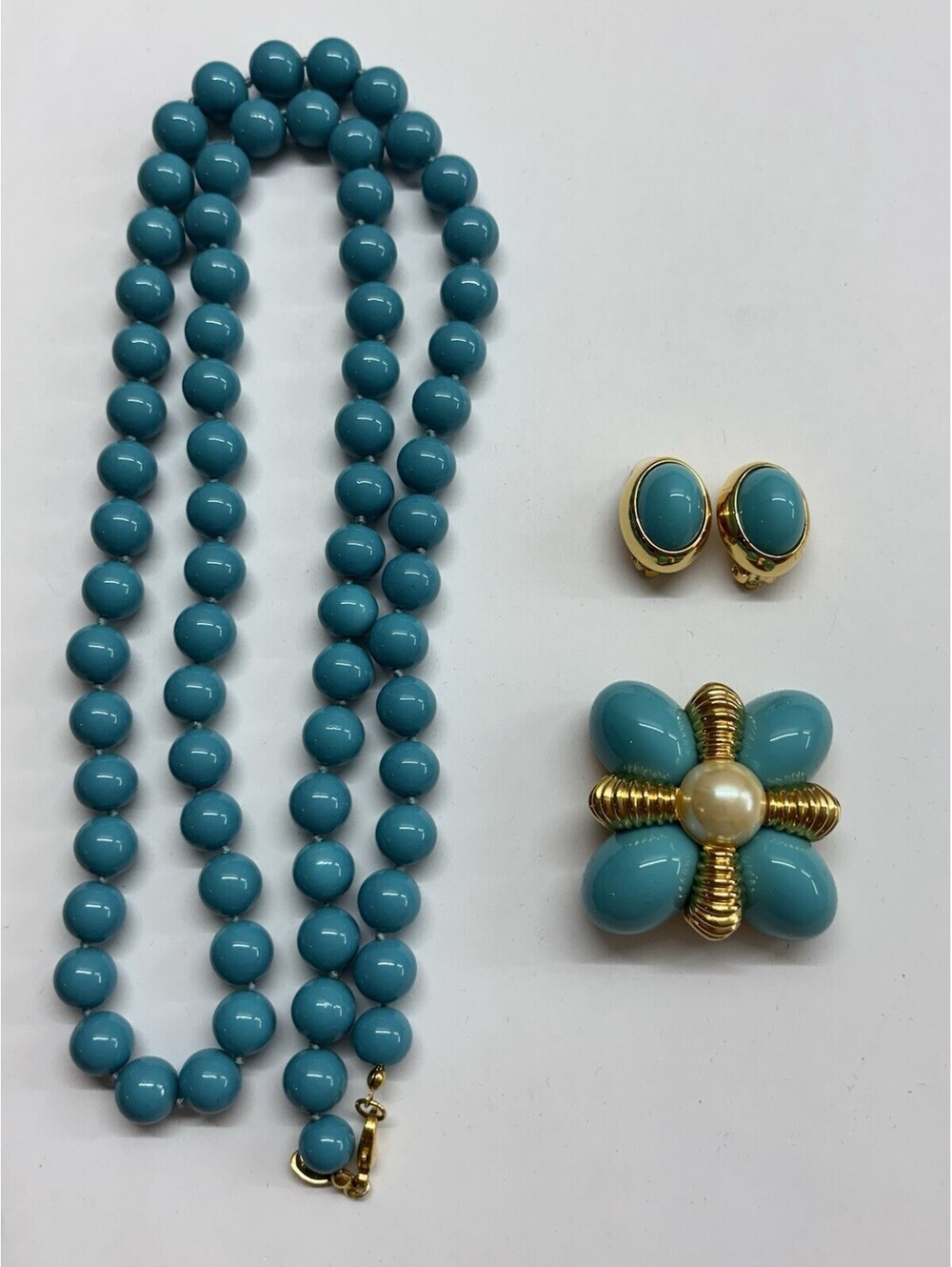 blue beaded joan rivers necklace, pendants and clip on earrings